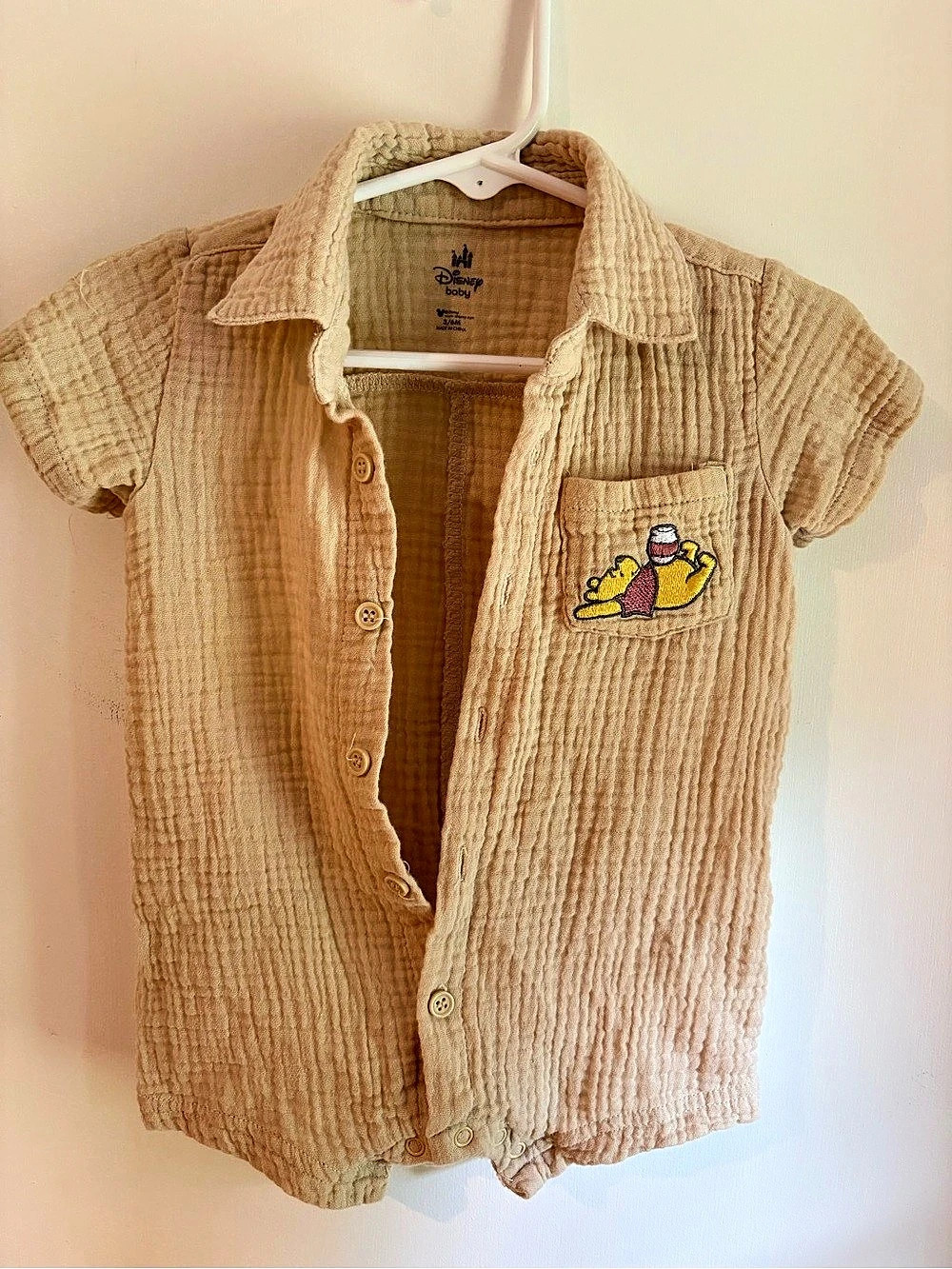 Disney Baby Short Sleeve Romper in Tan Like New
